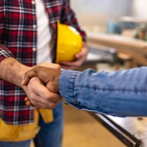 shaking hands with contractor